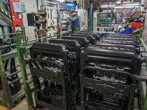 Seat frames in a manufacturing facility