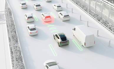 Rendering of vehicles driving along a highway showing how sensors indicate save spacing between vehicles