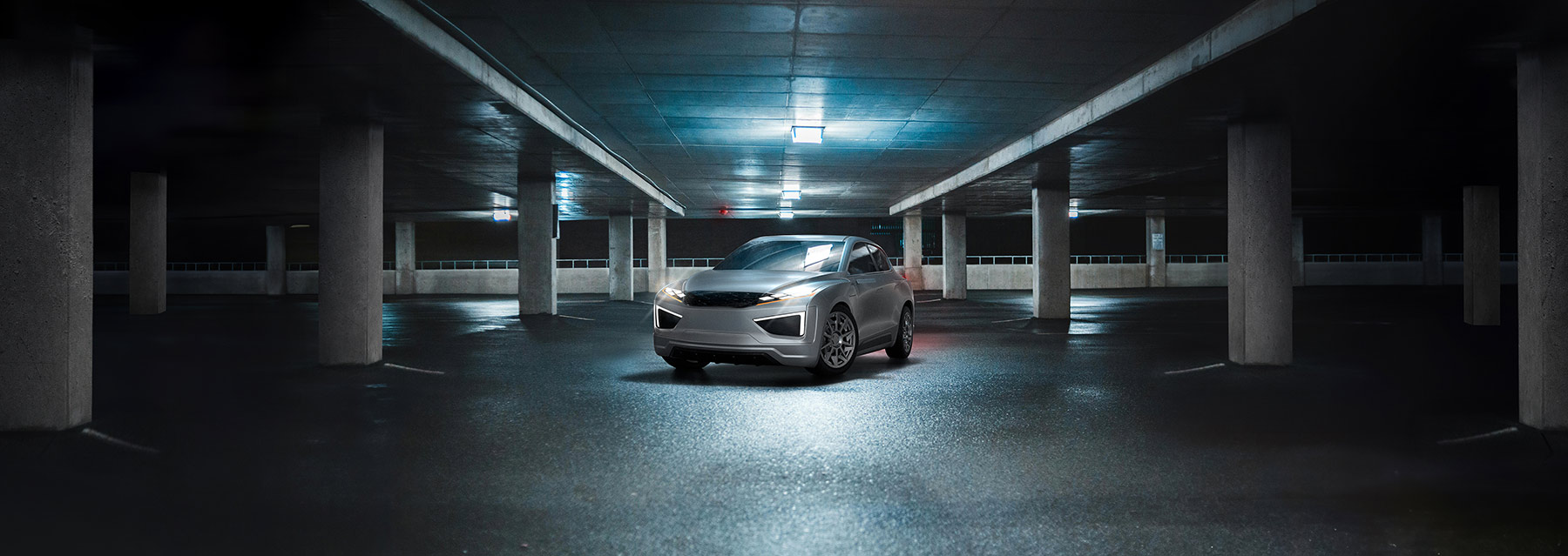 Grey vehicle parked in a parking garage