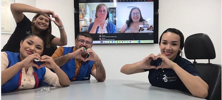 Team at Magna's division in Sabinas, Mexico signing "love" in a virtual meeting